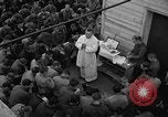 Image of U.S. Catholic chaplain conducts mass 3 days before D-Day Weymouth England United Kingdom, 1944, second 38 stock footage video 65675049229
