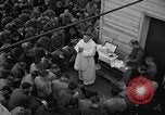 Image of U.S. Catholic chaplain conducts mass 3 days before D-Day Weymouth England United Kingdom, 1944, second 39 stock footage video 65675049229