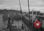 Image of U.S. landing craft  leave England for Invasion of Normandy, France, in Weymouth England United Kingdom, 1944, second 30 stock footage video 65675049231