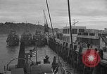 Image of U.S. landing craft  leave England for Invasion of Normandy, France, in Weymouth England United Kingdom, 1944, second 35 stock footage video 65675049231