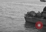 Image of U.S. landing craft  leave England for Invasion of Normandy, France, in Weymouth England United Kingdom, 1944, second 51 stock footage video 65675049231