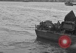Image of U.S. landing craft  leave England for Invasion of Normandy, France, in Weymouth England United Kingdom, 1944, second 52 stock footage video 65675049231