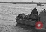Image of U.S. landing craft  leave England for Invasion of Normandy, France, in Weymouth England United Kingdom, 1944, second 54 stock footage video 65675049231