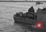 Image of U.S. landing craft  leave England for Invasion of Normandy, France, in Weymouth England United Kingdom, 1944, second 55 stock footage video 65675049231