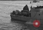 Image of U.S. landing craft  leave England for Invasion of Normandy, France, in Weymouth England United Kingdom, 1944, second 56 stock footage video 65675049231