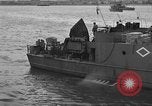 Image of U.S. landing craft  leave England for Invasion of Normandy, France, in Weymouth England United Kingdom, 1944, second 57 stock footage video 65675049231