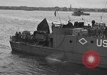 Image of U.S. landing craft  leave England for Invasion of Normandy, France, in Weymouth England United Kingdom, 1944, second 59 stock footage video 65675049231