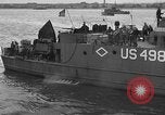 Image of U.S. landing craft  leave England for Invasion of Normandy, France, in Weymouth England United Kingdom, 1944, second 61 stock footage video 65675049231