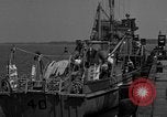 Image of Crew of USS Pilot AM-104 deploys and retrieves cables Chesapeake Bay, 1939, second 3 stock footage video 65675049270