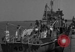 Image of Crew of USS Pilot AM-104 deploys and retrieves cables Chesapeake Bay, 1939, second 4 stock footage video 65675049270