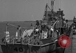 Image of Crew of USS Pilot AM-104 deploys and retrieves cables Chesapeake Bay, 1939, second 5 stock footage video 65675049270