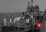Image of Crew of USS Pilot AM-104 deploys and retrieves cables Chesapeake Bay, 1939, second 6 stock footage video 65675049270