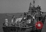 Image of Crew of USS Pilot AM-104 deploys and retrieves cables Chesapeake Bay, 1939, second 7 stock footage video 65675049270
