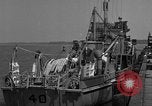 Image of Crew of USS Pilot AM-104 deploys and retrieves cables Chesapeake Bay, 1939, second 8 stock footage video 65675049270