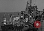 Image of Crew of USS Pilot AM-104 deploys and retrieves cables Chesapeake Bay, 1939, second 10 stock footage video 65675049270