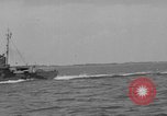 Image of Crew of USS Pilot AM-104 deploys and retrieves cables Chesapeake Bay, 1939, second 16 stock footage video 65675049270