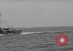 Image of Crew of USS Pilot AM-104 deploys and retrieves cables Chesapeake Bay, 1939, second 17 stock footage video 65675049270