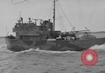 Image of Crew of USS Pilot AM-104 deploys and retrieves cables Chesapeake Bay, 1939, second 22 stock footage video 65675049270