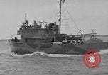 Image of Crew of USS Pilot AM-104 deploys and retrieves cables Chesapeake Bay, 1939, second 23 stock footage video 65675049270