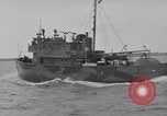 Image of Crew of USS Pilot AM-104 deploys and retrieves cables Chesapeake Bay, 1939, second 24 stock footage video 65675049270