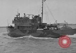 Image of Crew of USS Pilot AM-104 deploys and retrieves cables Chesapeake Bay, 1939, second 25 stock footage video 65675049270