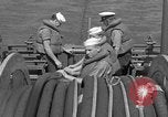 Image of Crew of USS Pilot AM-104 deploys and retrieves cables Chesapeake Bay, 1939, second 42 stock footage video 65675049270