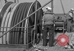 Image of Crew of USS Pilot AM-104 deploys and retrieves cables Chesapeake Bay, 1939, second 54 stock footage video 65675049270