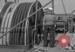 Image of Crew of USS Pilot AM-104 deploys and retrieves cables Chesapeake Bay, 1939, second 55 stock footage video 65675049270