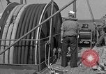 Image of Crew of USS Pilot AM-104 deploys and retrieves cables Chesapeake Bay, 1939, second 56 stock footage video 65675049270