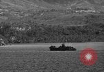 Standbild Tanks explodieren Guam, 1944, aus Sekunde 56 historischem Filmmaterial Videoclip 65675049307