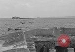 Image of seawall Cherbourg Normandy France, 1944, second 16 stock footage video 65675049315
