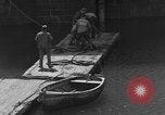 Image of wooden crates Cherbourg Normandy France, 1944, second 4 stock footage video 65675049320