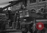 Image of wooden crates Cherbourg Normandy France, 1944, second 5 stock footage video 65675049320