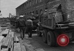 Image of wooden crates Cherbourg Normandy France, 1944, second 58 stock footage video 65675049320