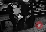 Standbild britischen Matrosen Schiff Hafen Neufundland, 1941, aus Sekunde 33 historischem Filmmaterial Videoclip 65675049358