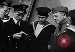 Standbild Crew der USS Augusta besuchen HMS Prince of Wales Schiff Hafen Neufundland, 1941, aus Sekunde 39 historischem Filmmaterial Videoclip 65675049359
