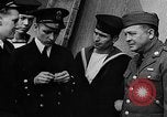 Standbild Crew der USS Augusta besuchen HMS Prince of Wales Schiff Hafen Neufundland, 1941, aus Sekunde 41 historischem Filmmaterial Videoclip 65675049359