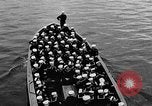 Standbild Crew der USS Augusta besuchen HMS Prince of Wales Schiff Hafen Neufundland, 1941, aus Sekunde 45 historischem Filmmaterial Videoclip 65675049359