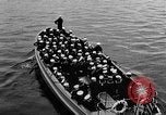 Standbild Crew der USS Augusta besuchen HMS Prince of Wales Schiff Hafen Neufundland, 1941, aus Sekunde 47 historischem Filmmaterial Videoclip 65675049359