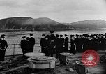 Standbild Crew der USS Augusta besuchen HMS Prince of Wales Schiff Hafen Neufundland, 1941, aus Sekunde 62 historischem Filmmaterial Videoclip 65675049359