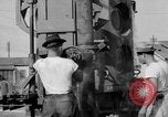 Image LeRoy Ashmore démontrant sa machine de lutte contre l'incendie Houston Texas USA, 1938, de la seconde 54 séquences d'archives historiques vidéo 65675049471