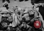 Image of pile of dead Buchenwald Germany, 1945, second 33 stock footage video 65675049492