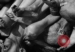 Image of pile of dead Buchenwald Germany, 1945, second 49 stock footage video 65675049492