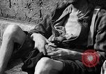 Image of victims Buchenwald Germany, 1945, second 14 stock footage video 65675049493