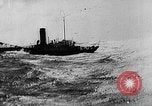 Image of disabled freighter Atlantic Ocean, 1935, second 25 stock footage video 65675049559