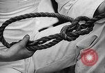 Image of knot tying and flag semaphore Connecticut USA, 1935, second 21 stock footage video 65675049560