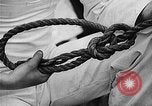 Image of knot tying and flag semaphore Connecticut USA, 1935, second 22 stock footage video 65675049560