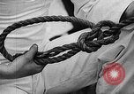 Image of knot tying and flag semaphore Connecticut USA, 1935, second 23 stock footage video 65675049560