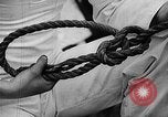 Image of knot tying and flag semaphore Connecticut USA, 1935, second 24 stock footage video 65675049560