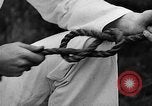 Image of knot tying and flag semaphore Connecticut USA, 1935, second 25 stock footage video 65675049560